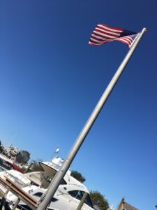 A flagpole with the US flag