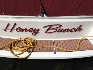 A white boat named Honey Bunch